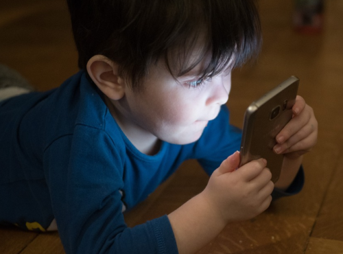 Little child using smartphone